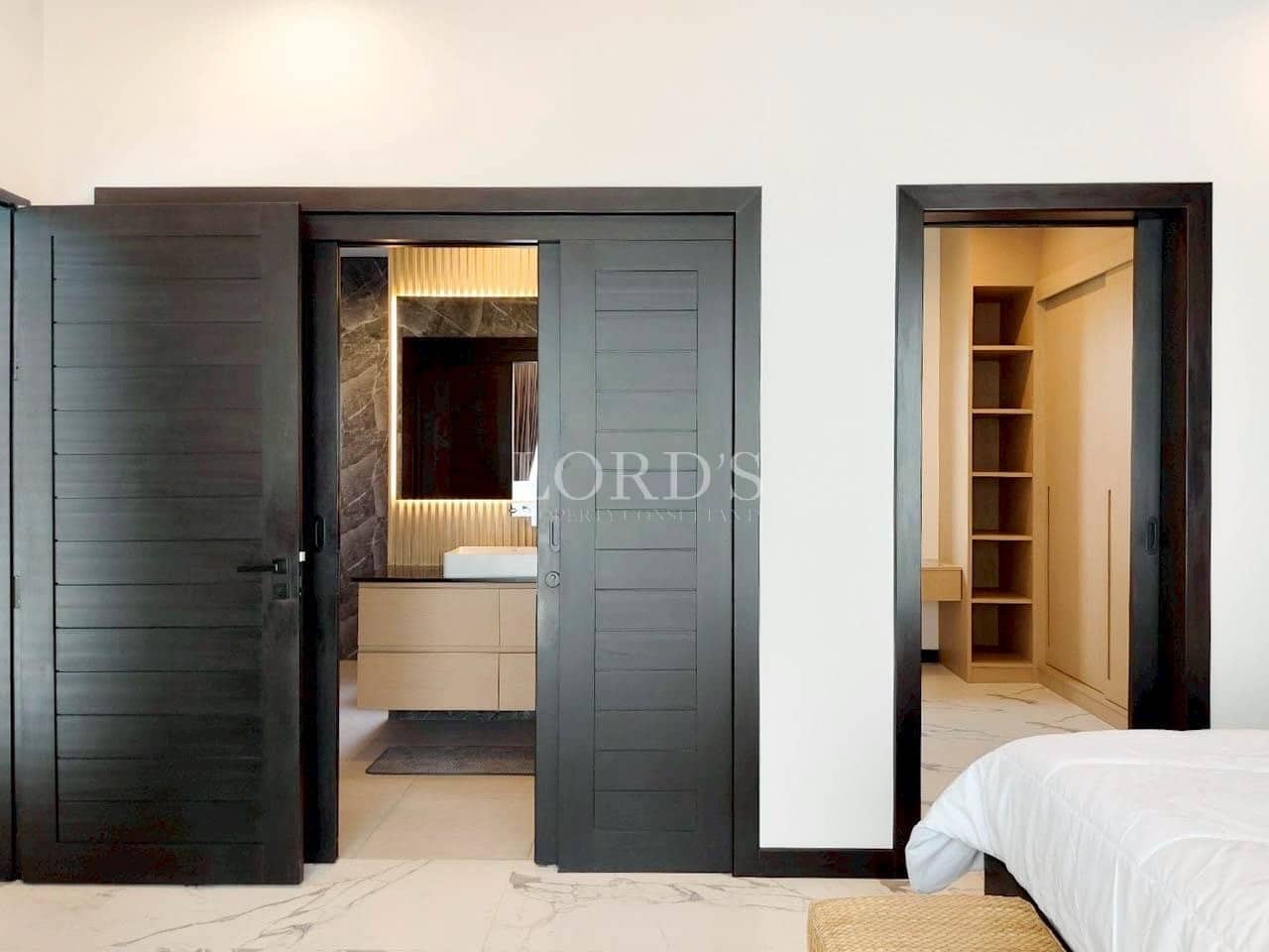bedroom with black door