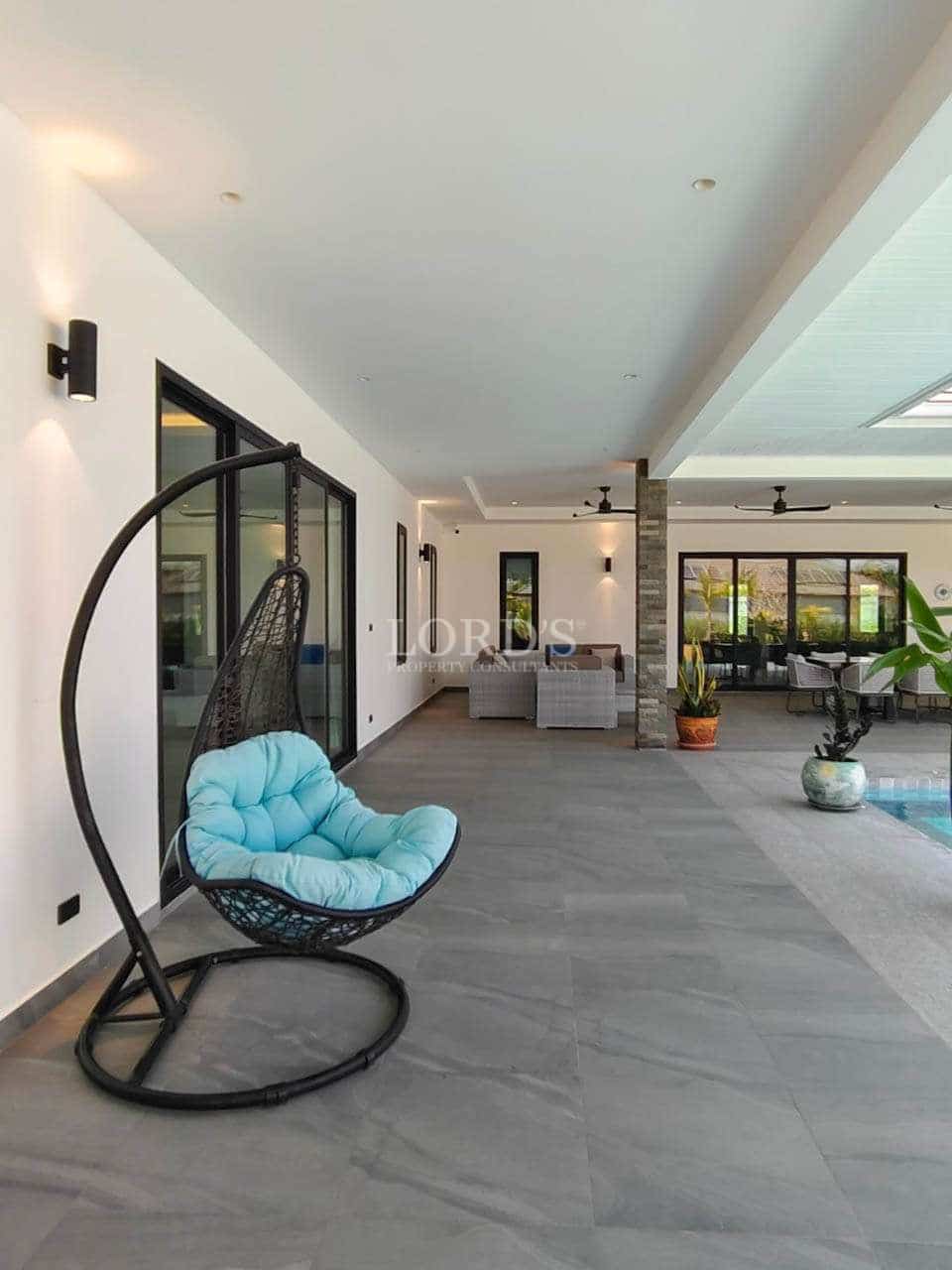 Modern interior with hanging chair