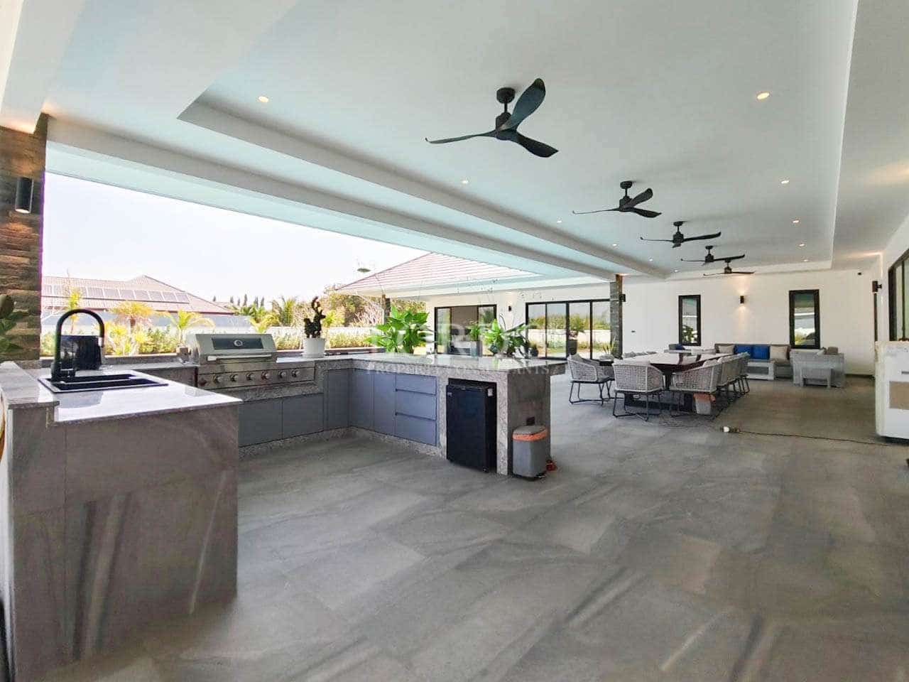 Spacious outdoor kitchen and living area