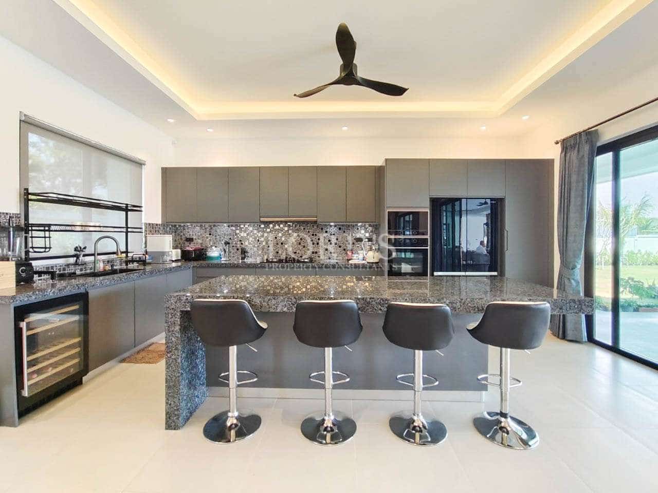 Modern kitchen with bar stools