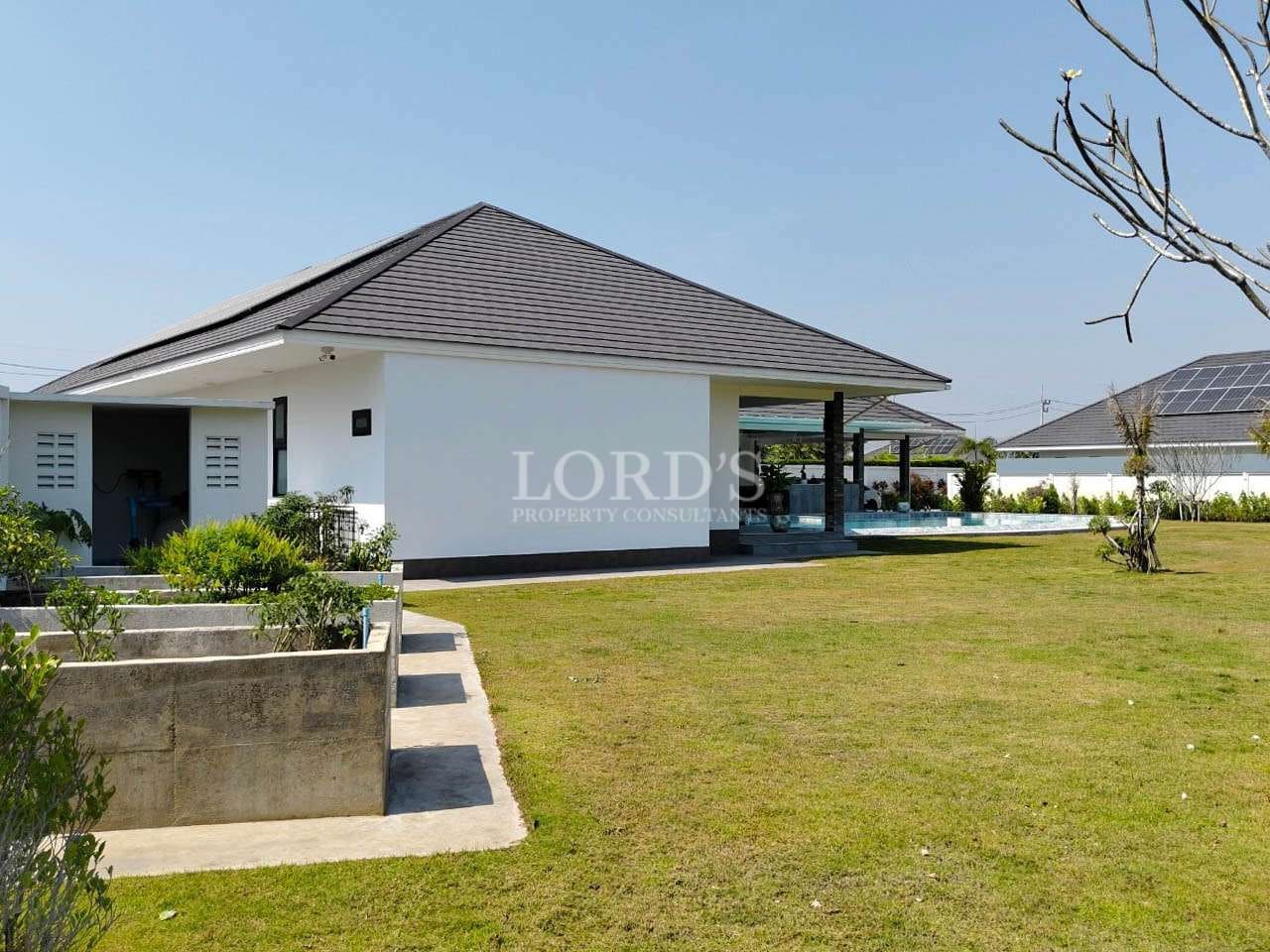 Modern house with green lawn