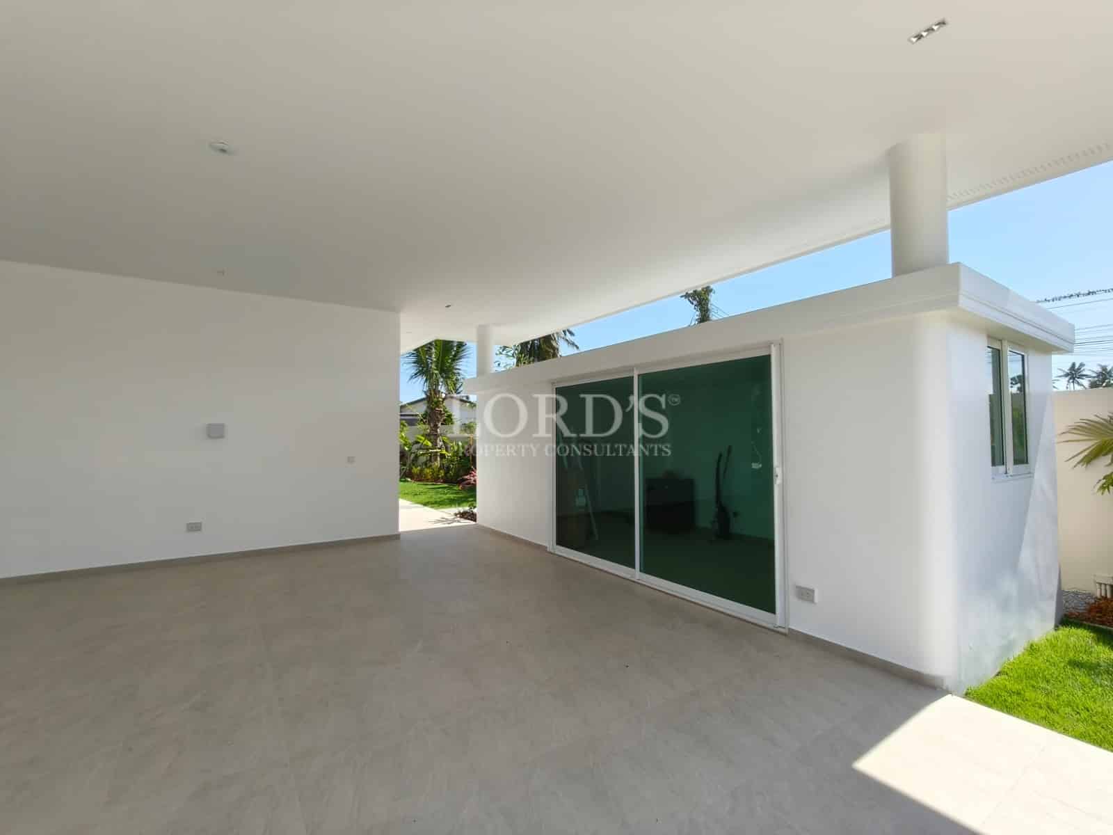 Modern empty room with large windows