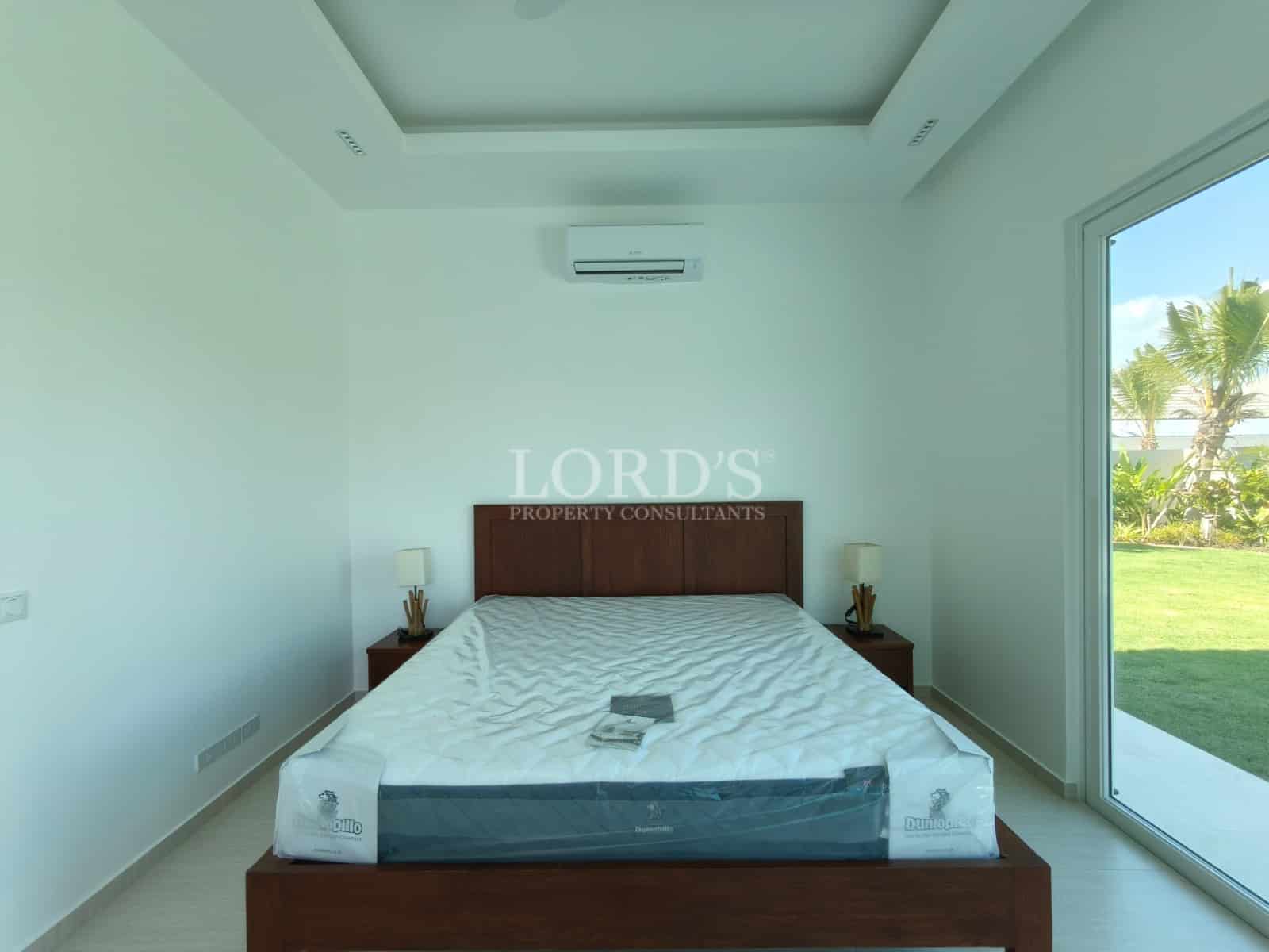 Minimalist bedroom with large window