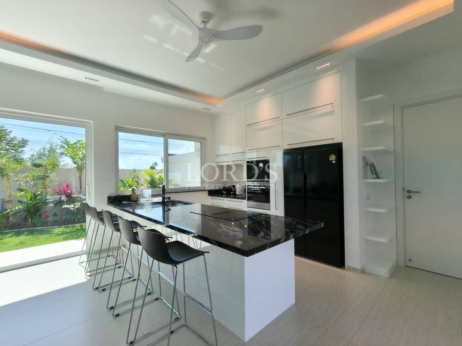 Modern kitchen with island seating.