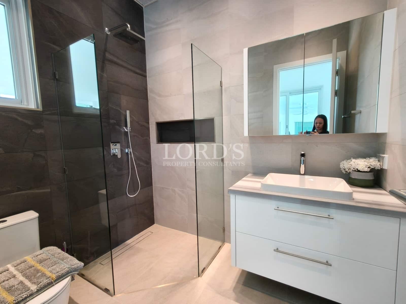 Modern bathroom with glass shower.