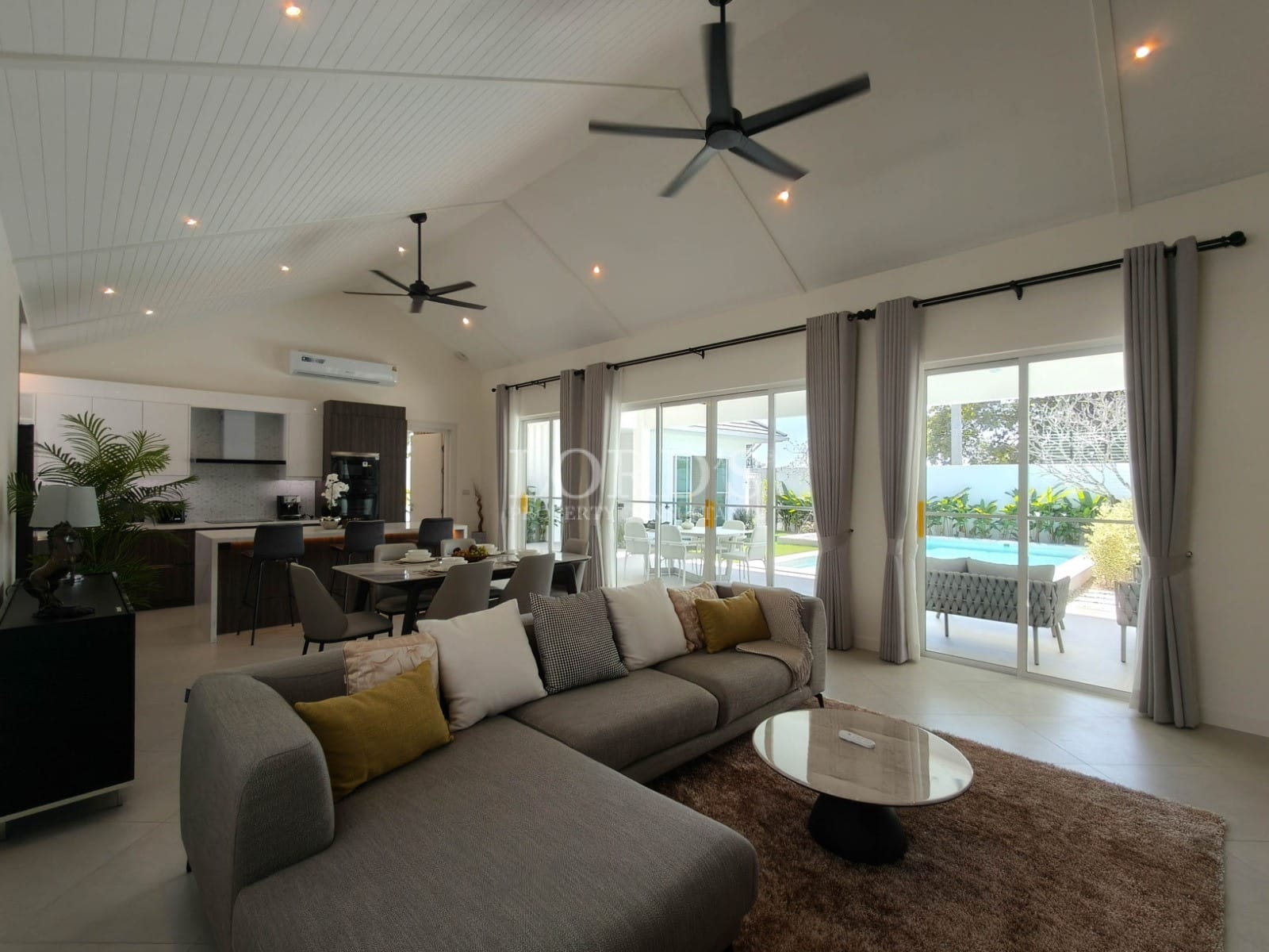 Modern living room with pool view