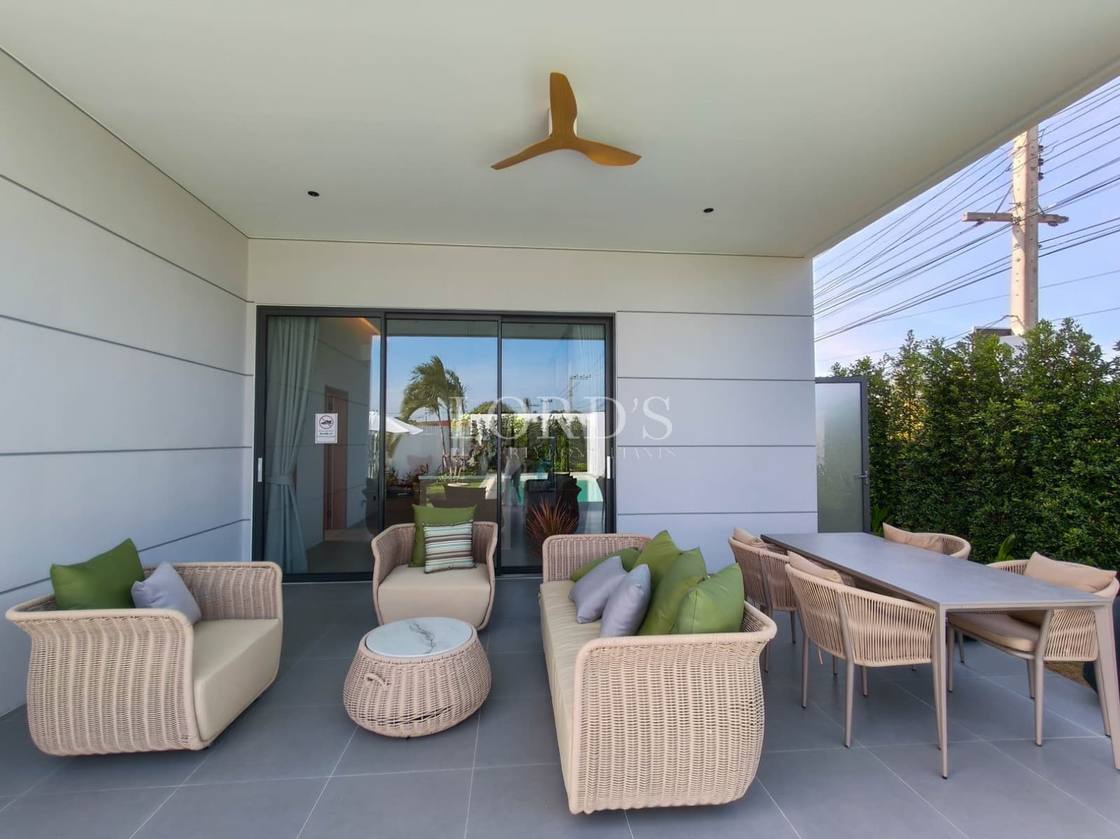 Modern outdoor seating area with greenery