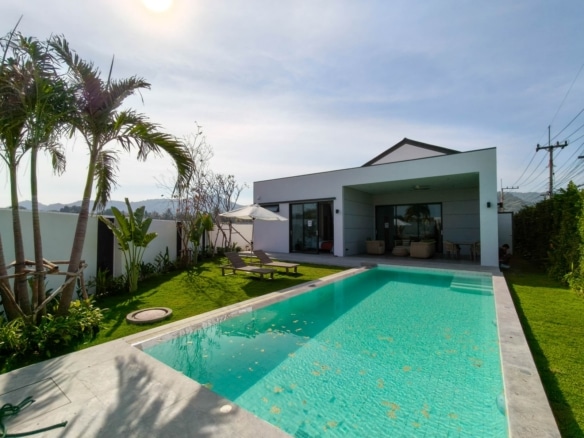 Modern house with pool and greenery