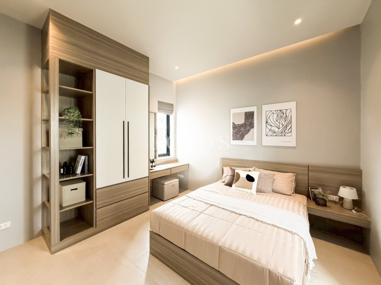 Modern bedroom with built-in wardrobe, neutral decor, and warm ambient lighting.
