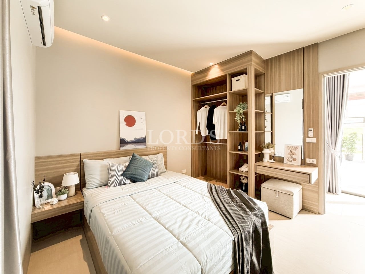 Modern bedroom with built-in wardrobe, wooden finishes, and soft ambient lighting.