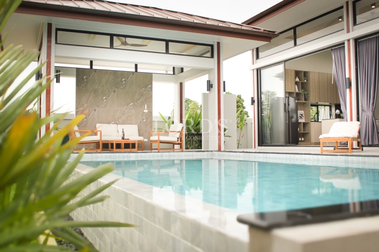 Modern home with pool and seating