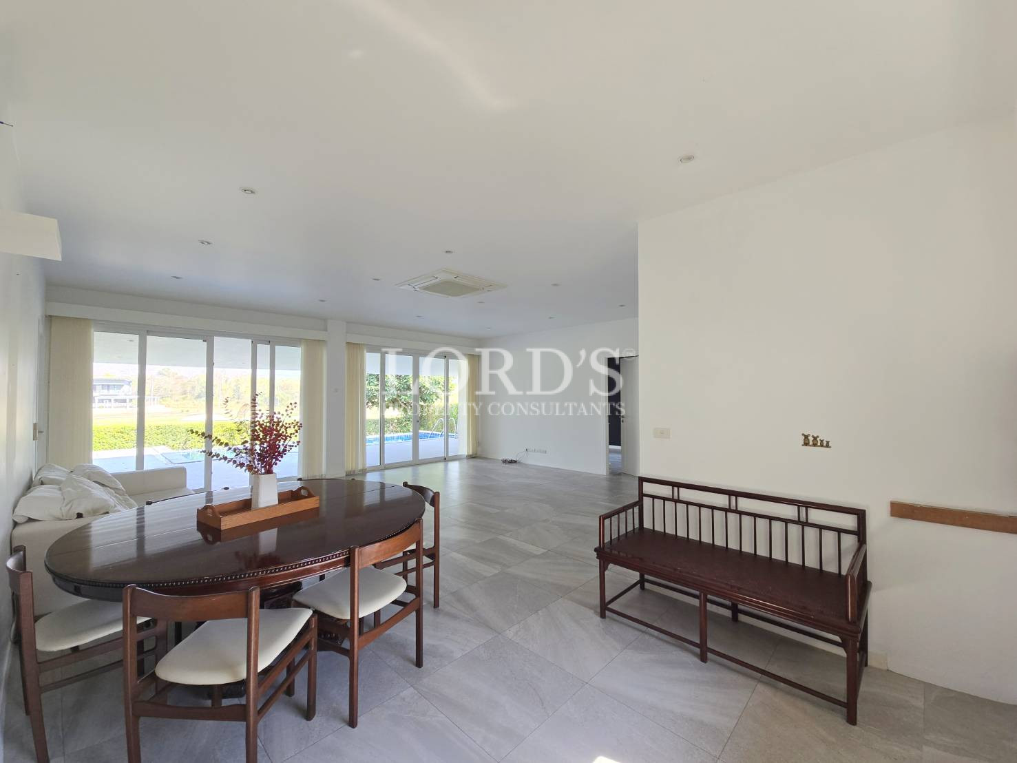 Dining area with wooden table and chairs