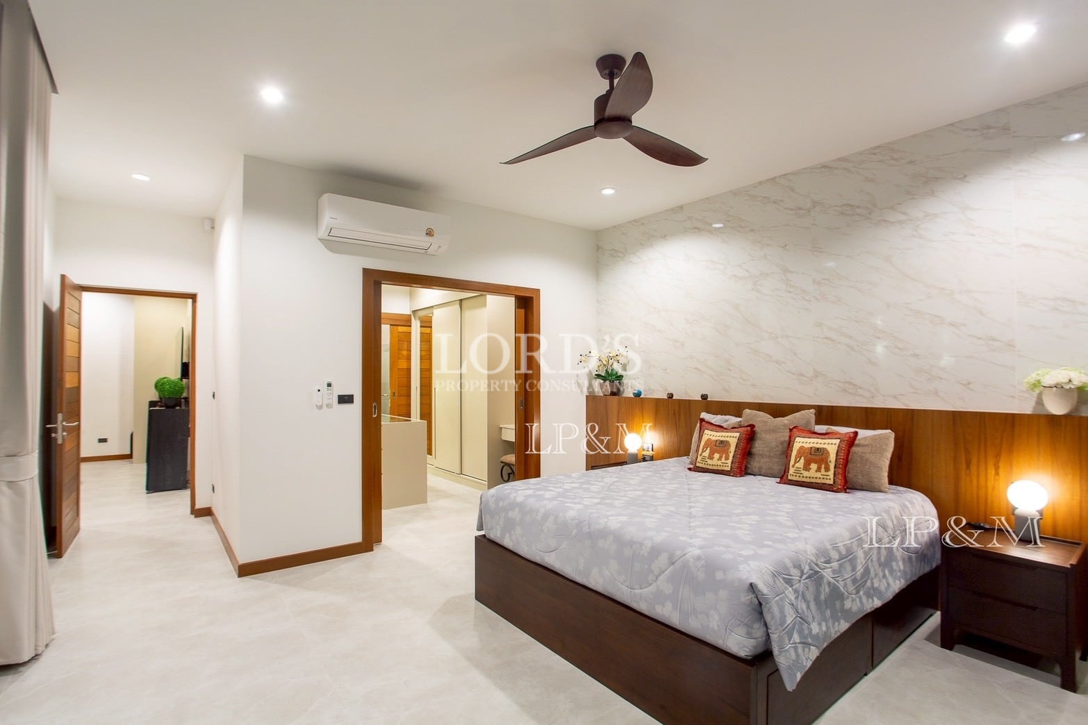 Bedroom with warm lighting and decor