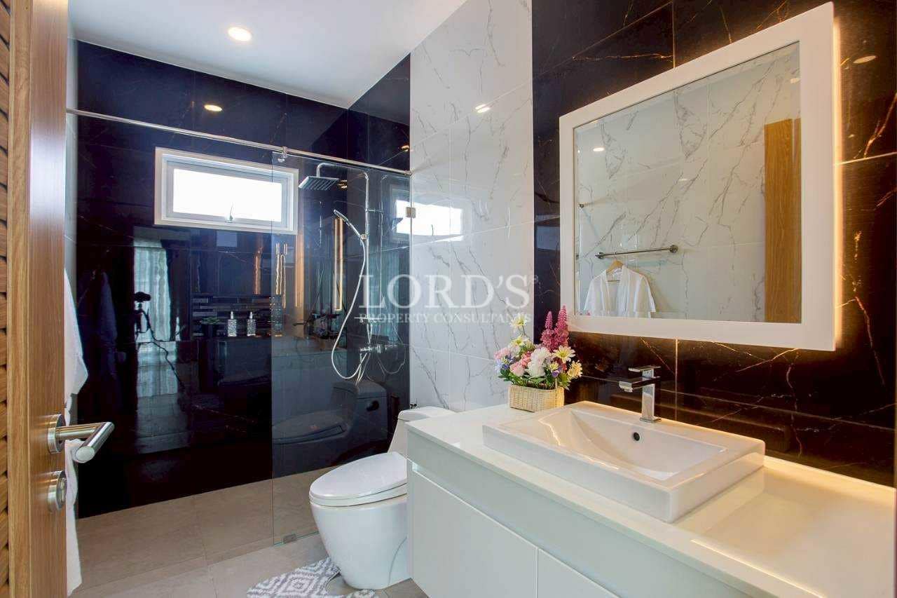 Bathroom with glass shower and vanity