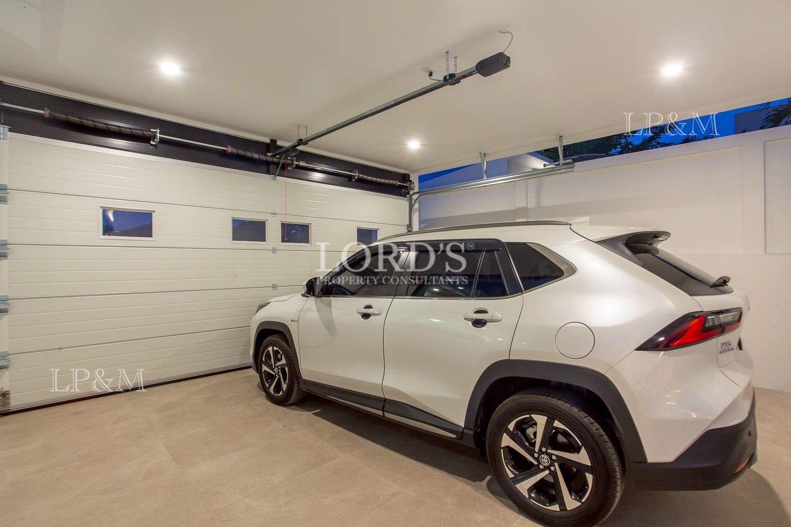 Garage with parked SUV