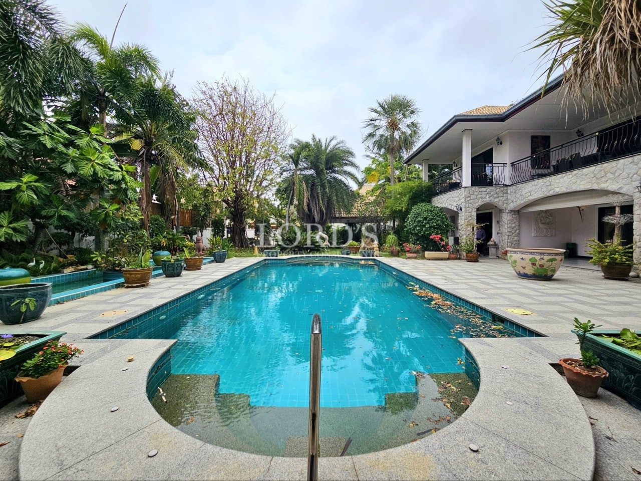 Outdoor seating area near the swimming pool