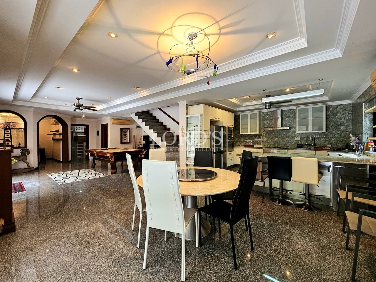 Open plan living and dining room with modern décor