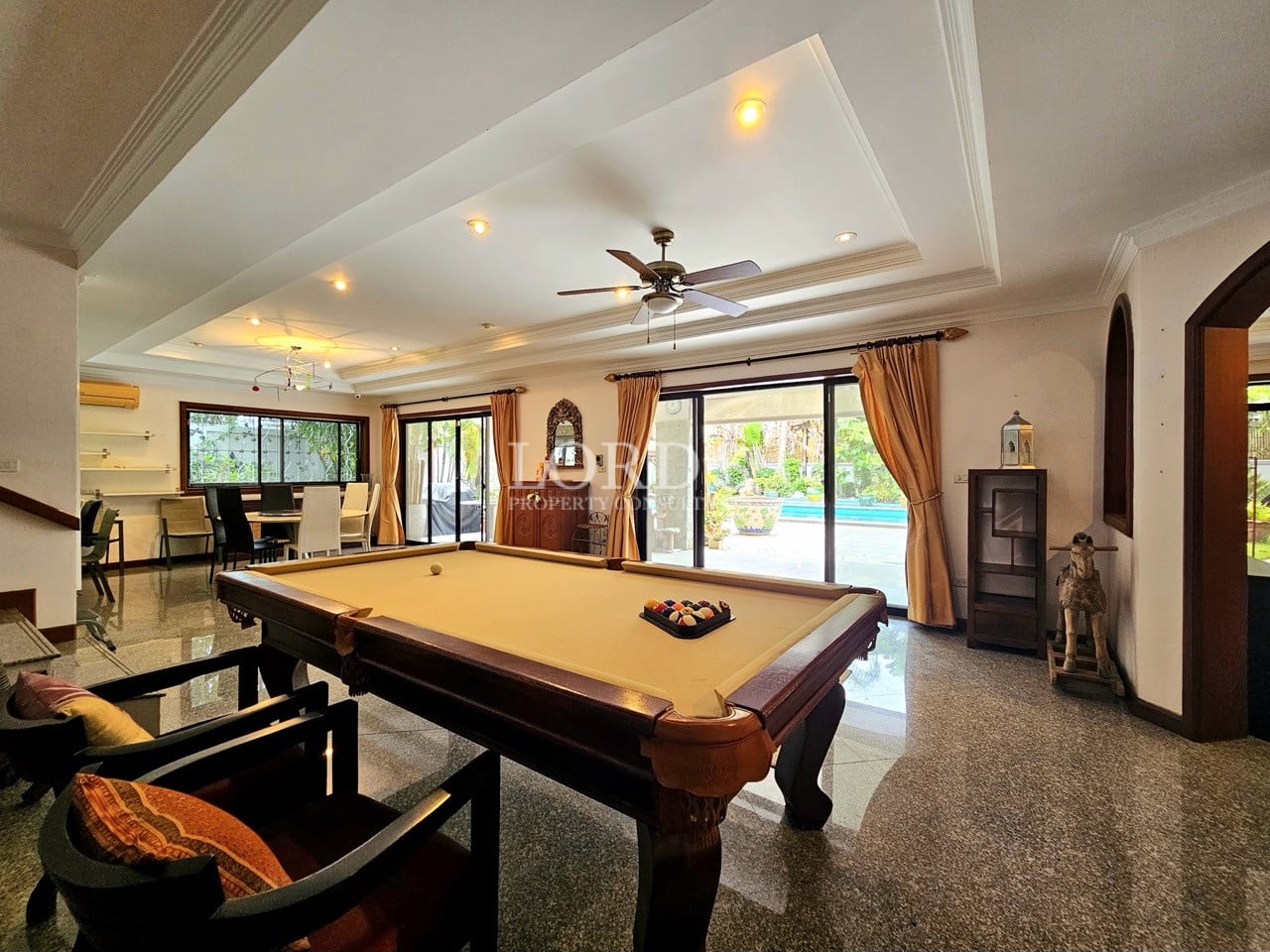 Indoor billiards table in entertainment room