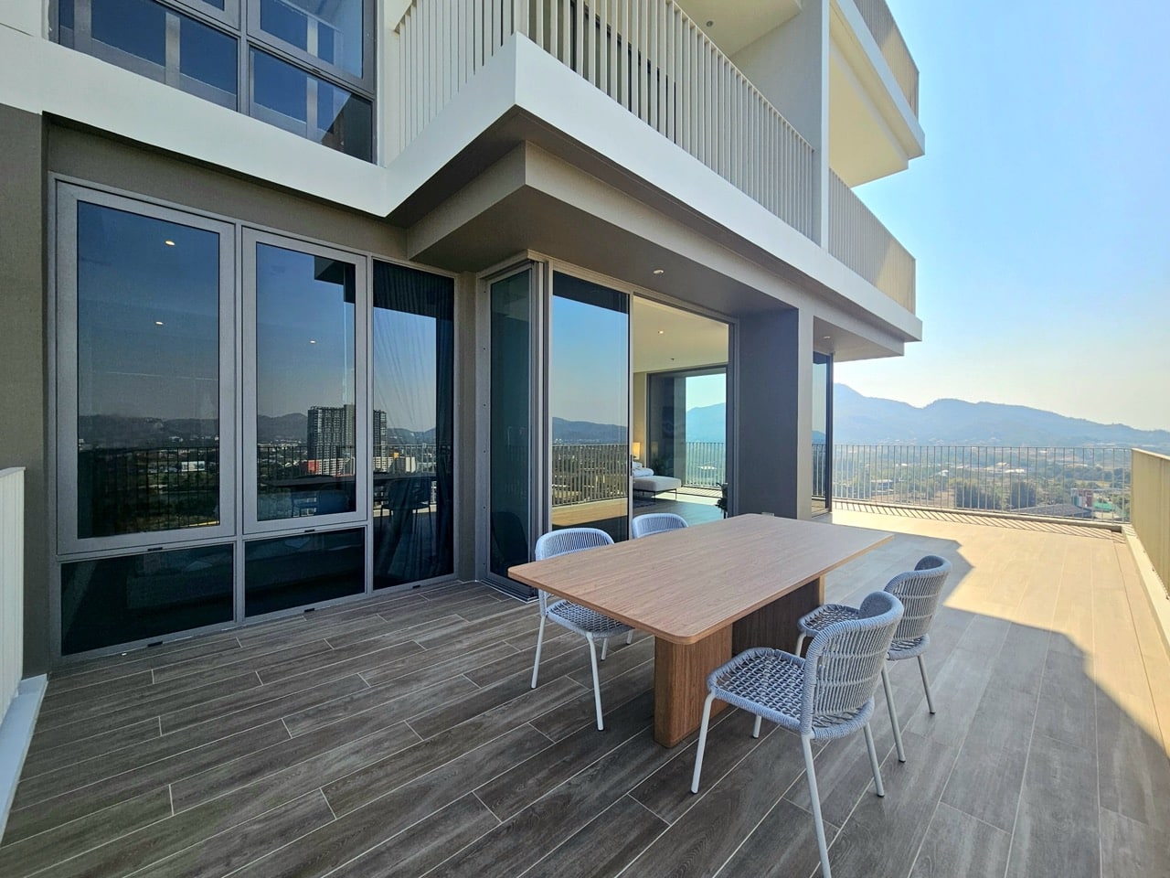 Outdoor dining area on balcony with table