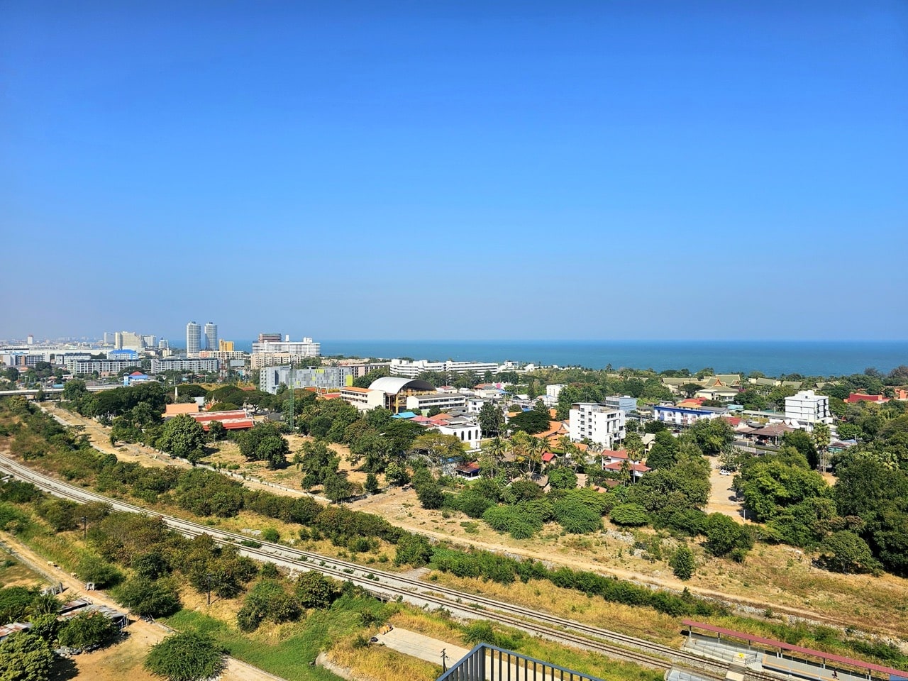 Wide city view with roads and buildings