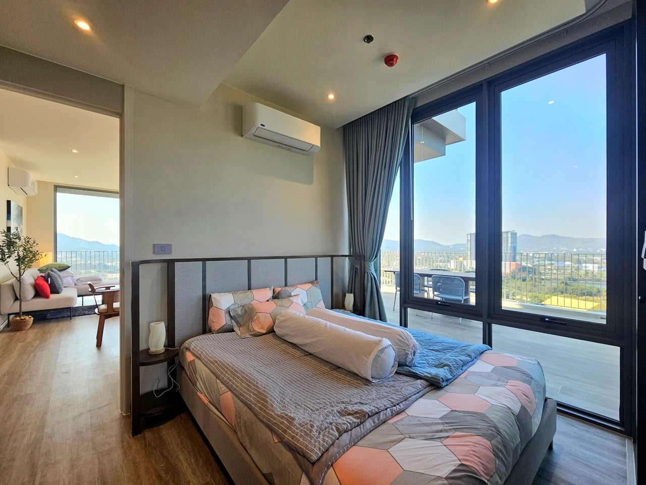 Bedroom with bed, window, and natural light