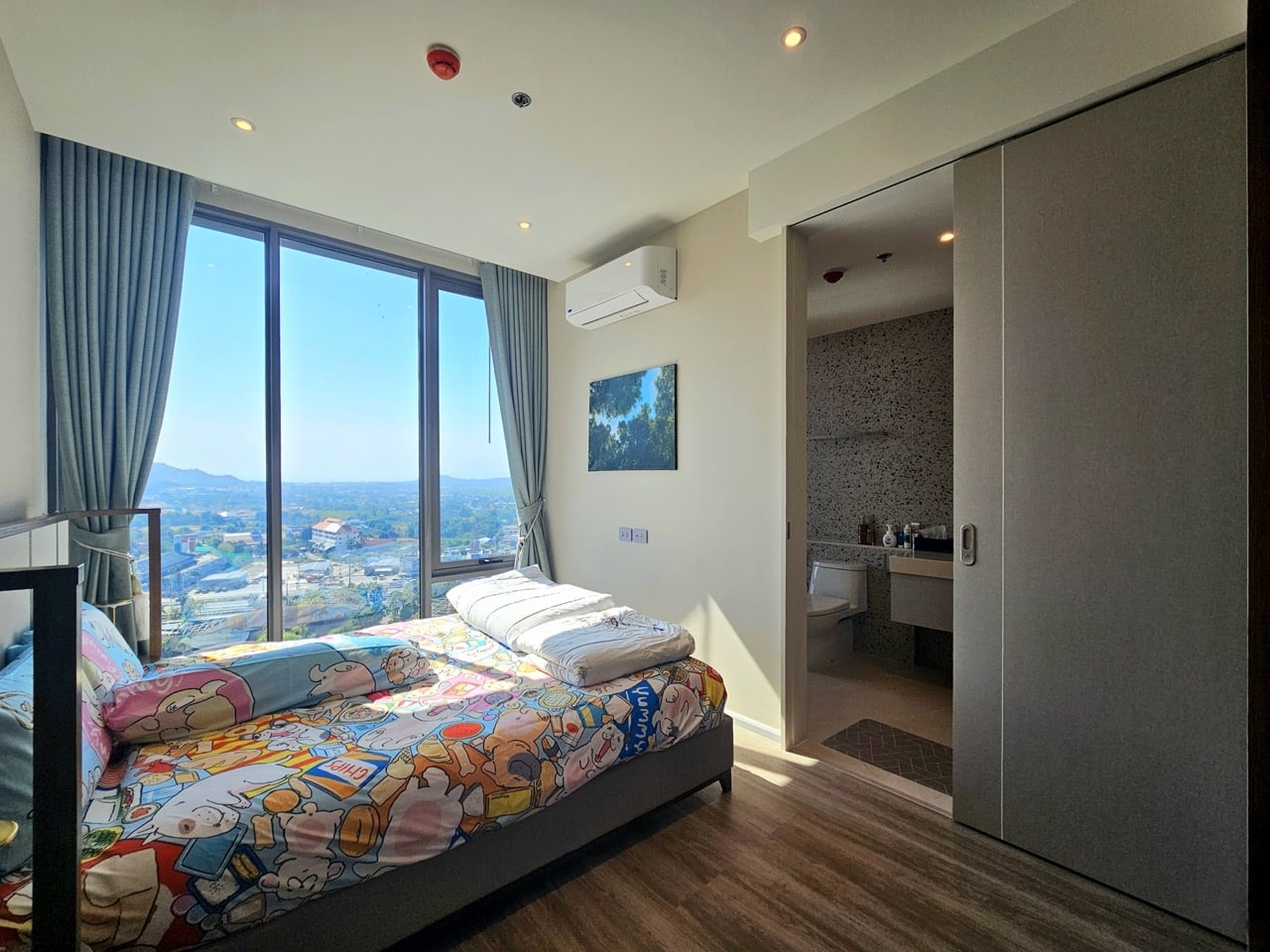 Bedroom with modern furniture and wardrobe