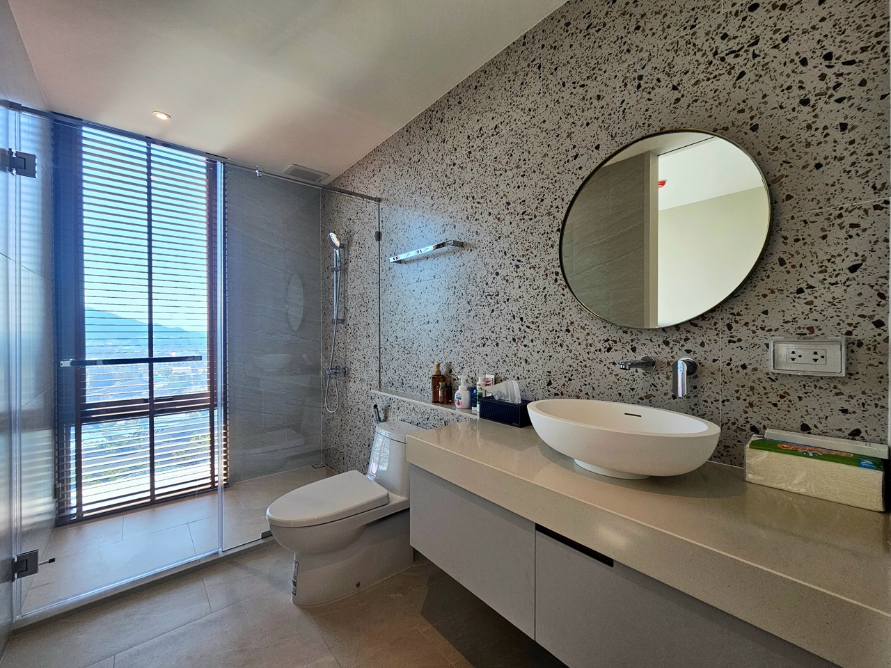 Luxury bathroom with long vanity and mirror