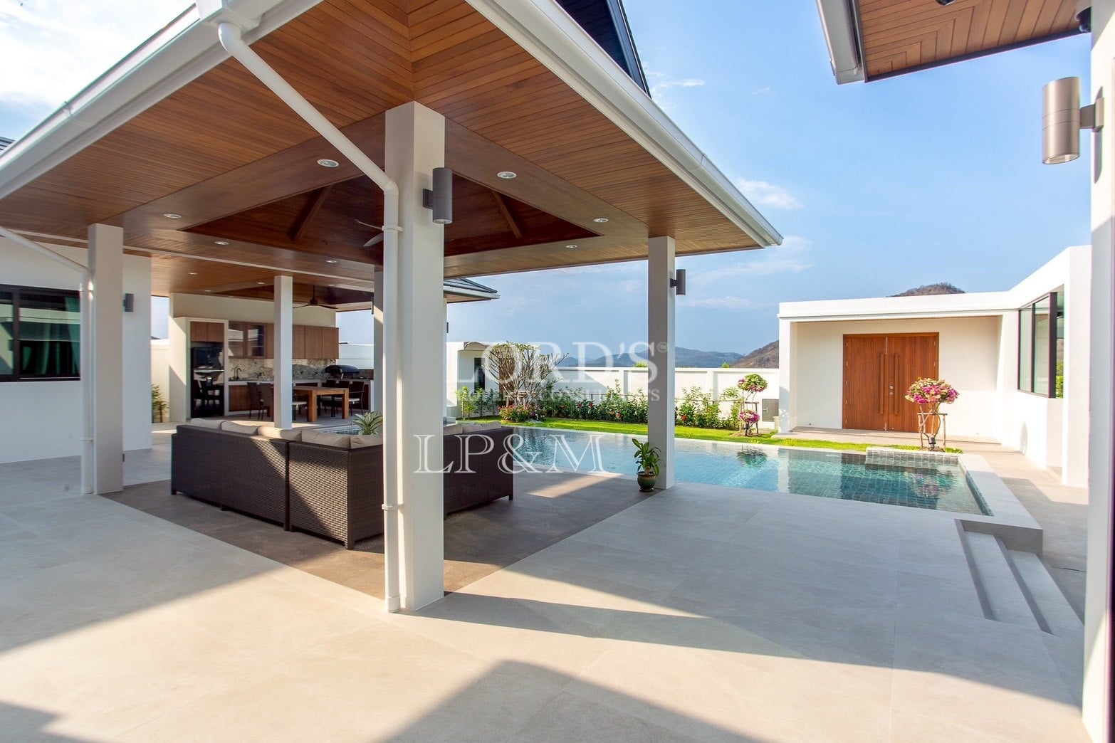 Covered patio overlooking pool