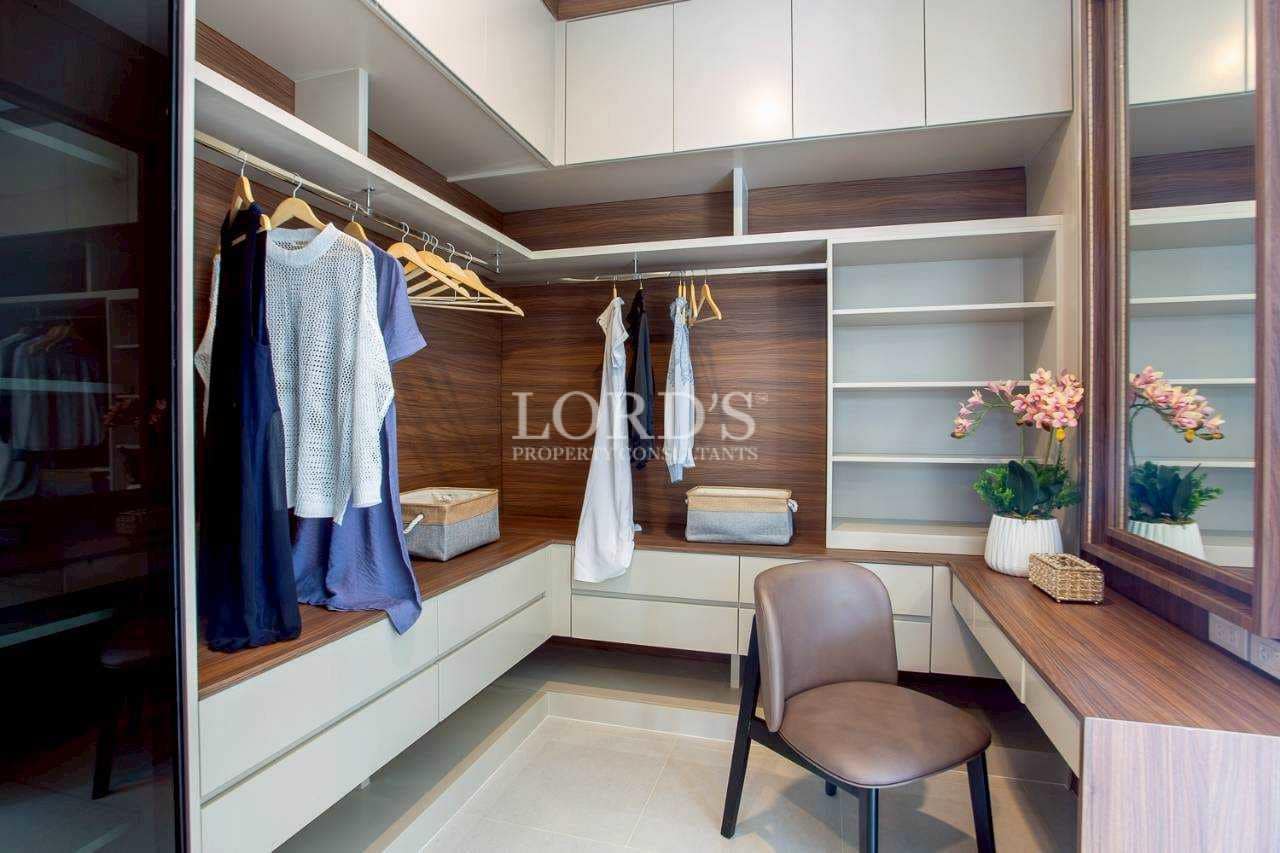 Walk-in closet with wooden shelves