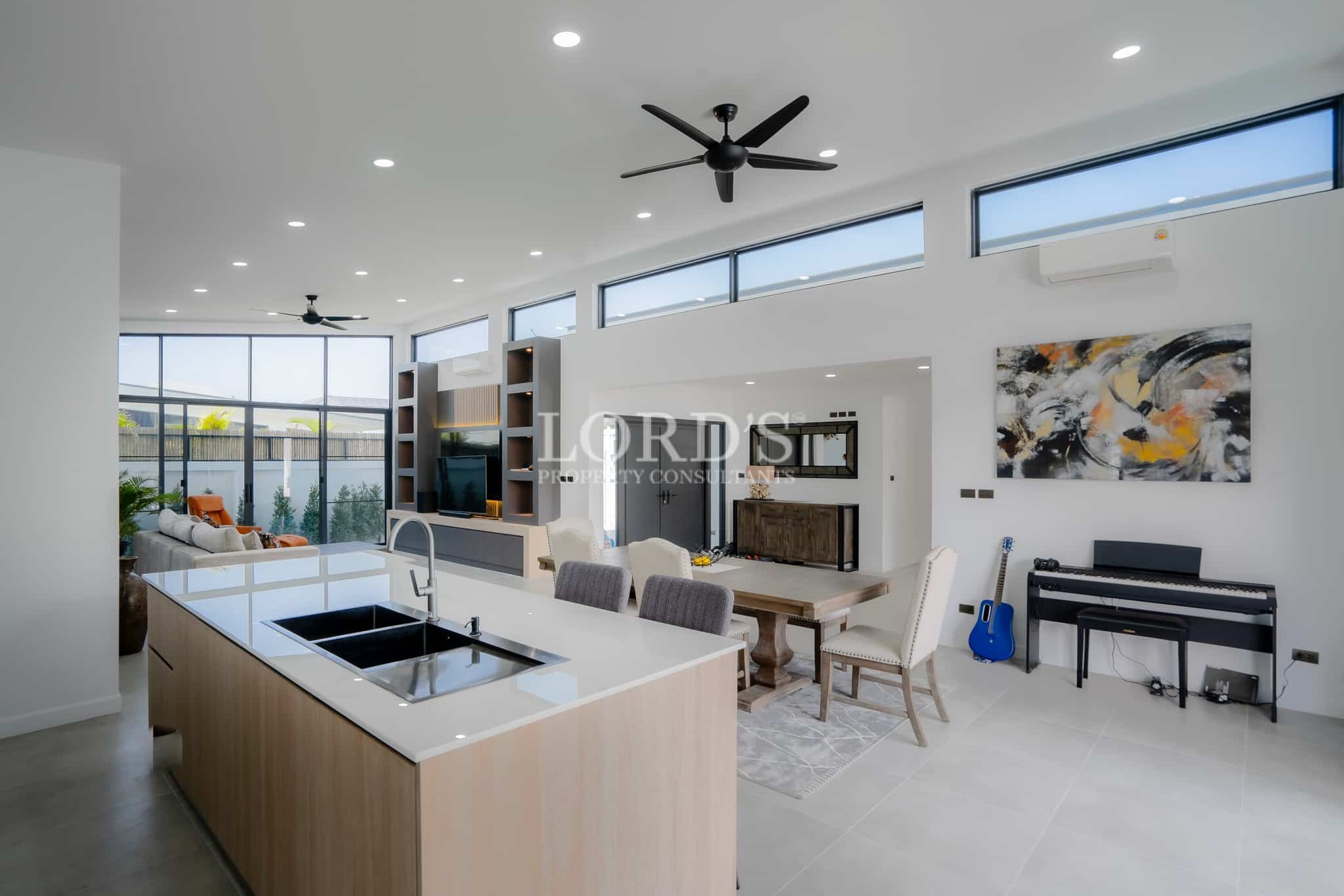Open kitchen with island counter and seating