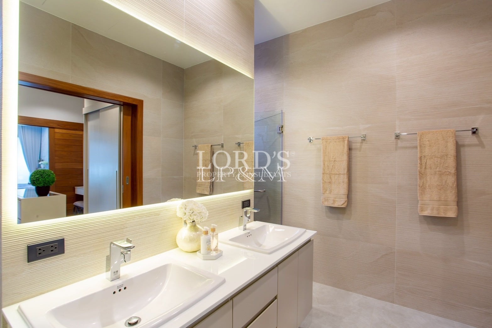 Bathroom vanity with large mirror