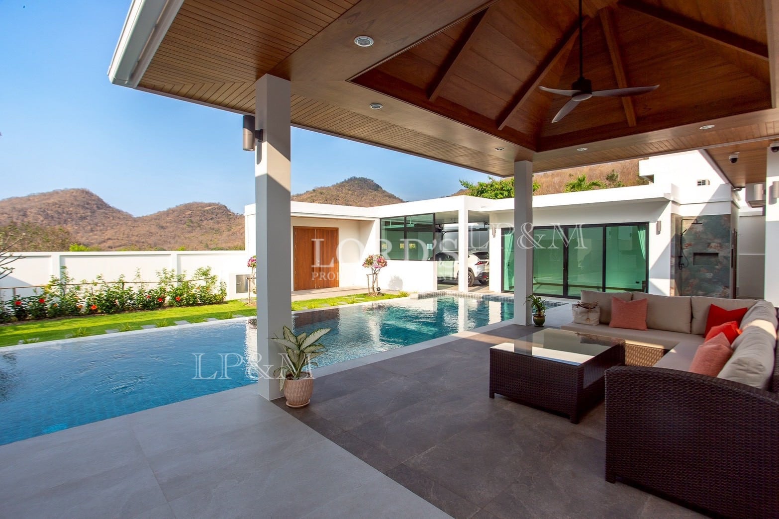 Covered outdoor lounge with sofa