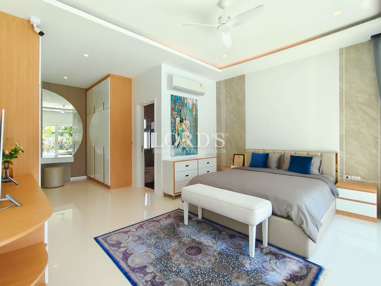 Bright bedroom with bench seating