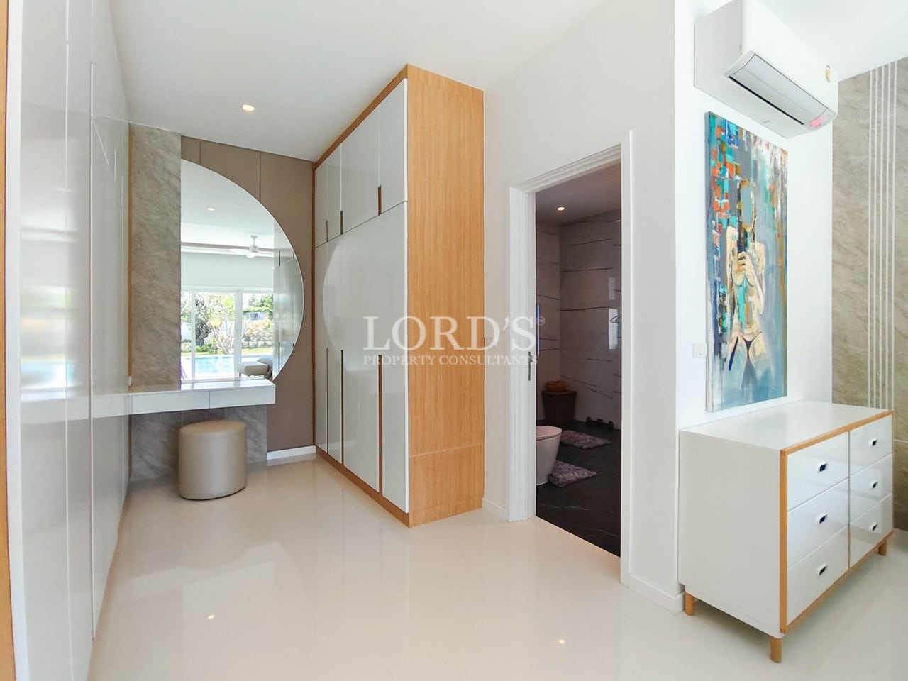 Bedroom hallway with wardrobe storage