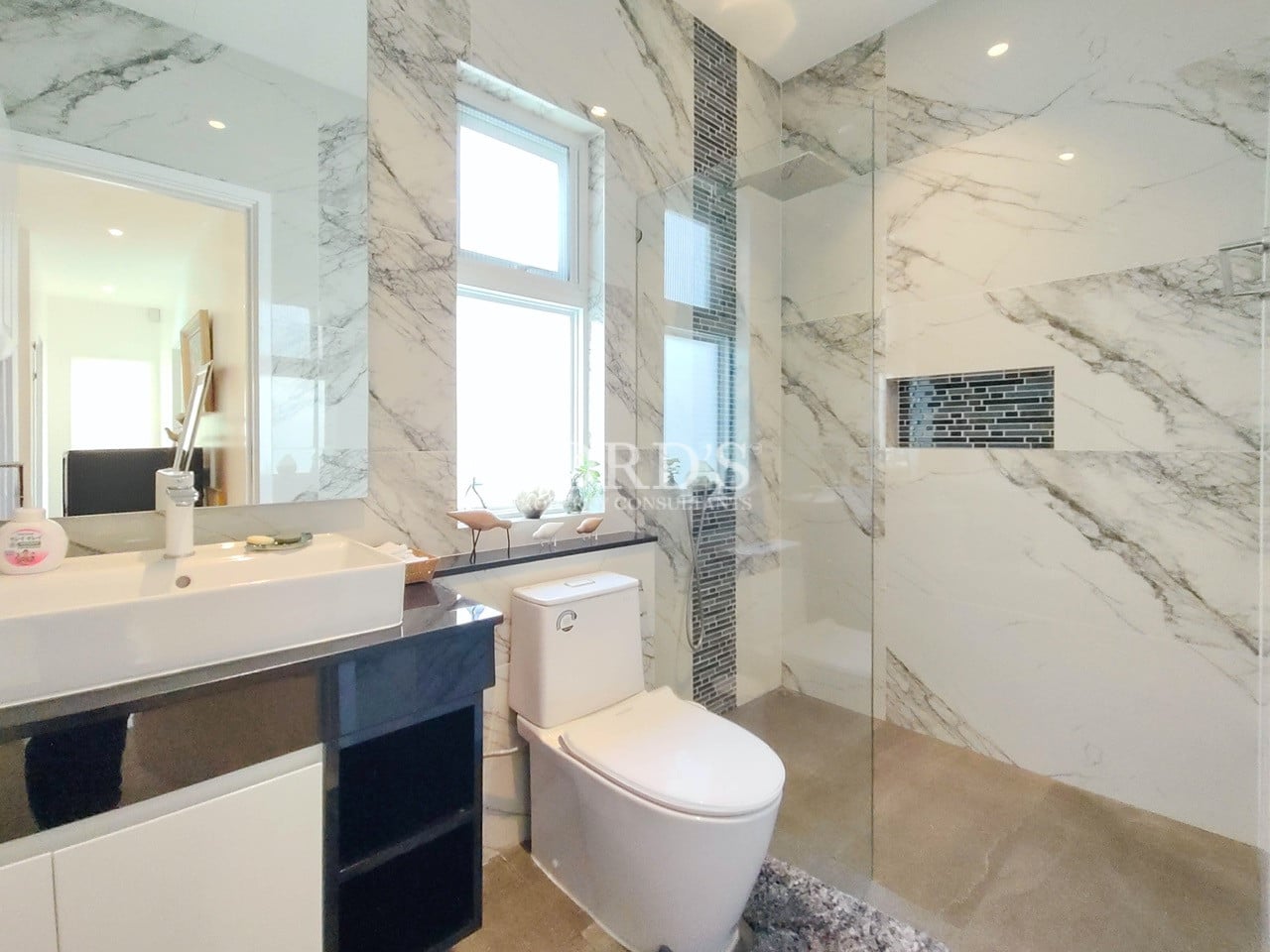 Luxury bathroom with marble wall tiles