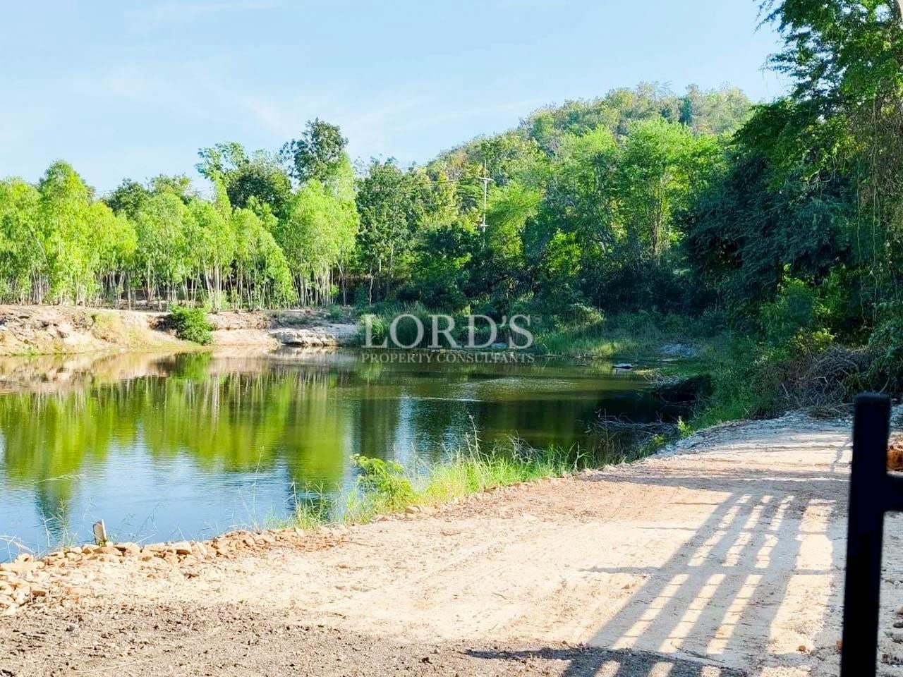 Scenic lake view surrounded by green hills