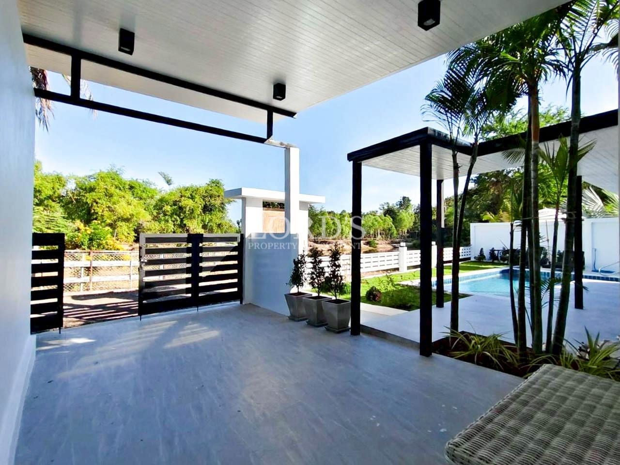 Outdoor terrace with large glass doors