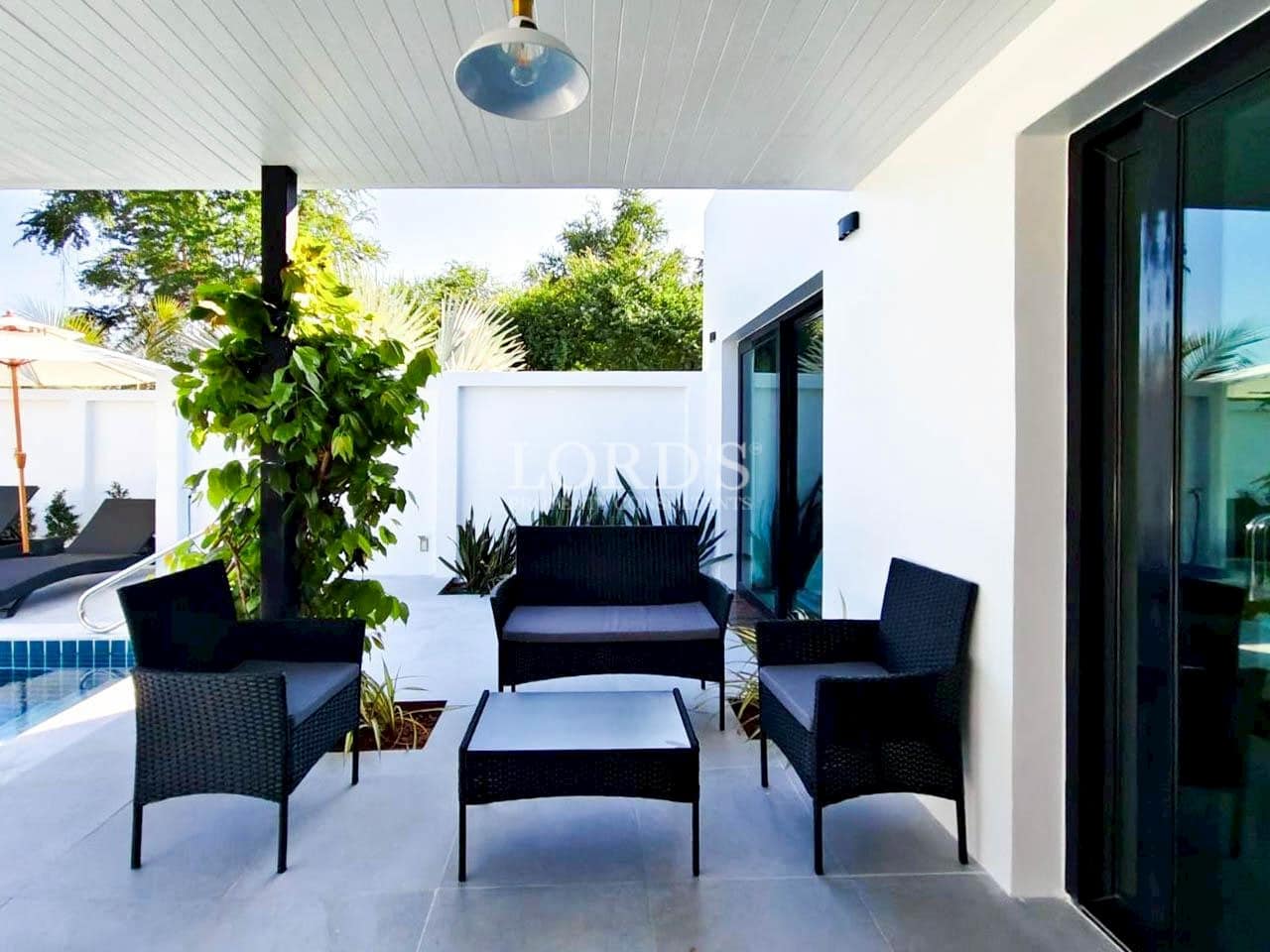 Balcony seating with modern chairs and table