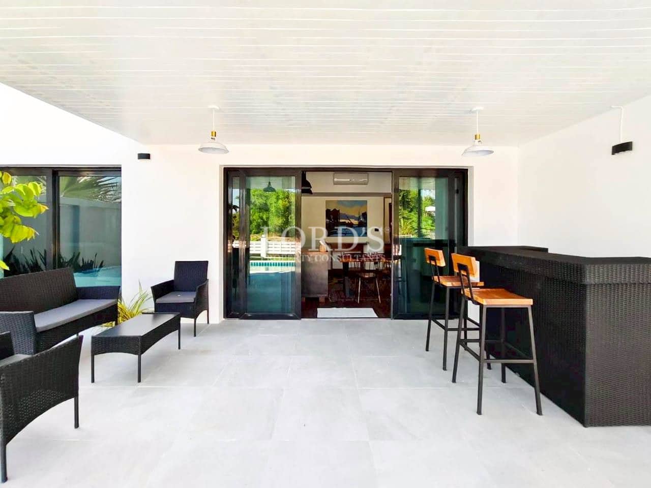 Outdoor patio seating area with modern furniture