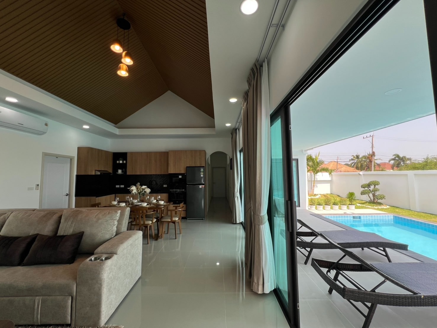 Outdoor patio with chairs and small pool