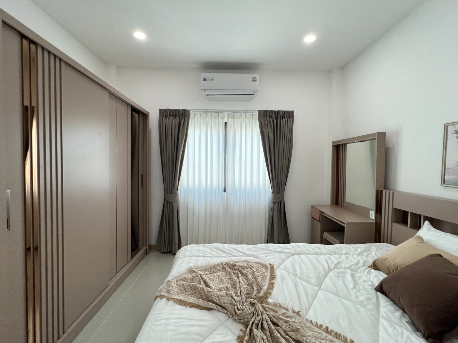 Bedroom with bed and curtains