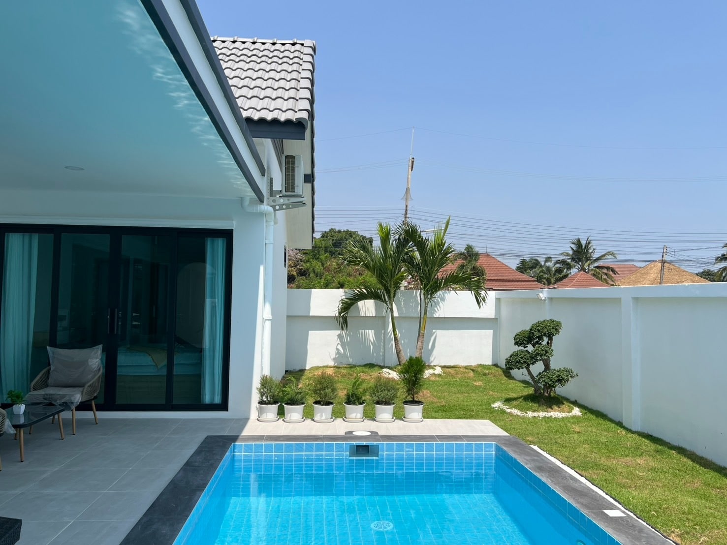 Swimming pool with villa exterior