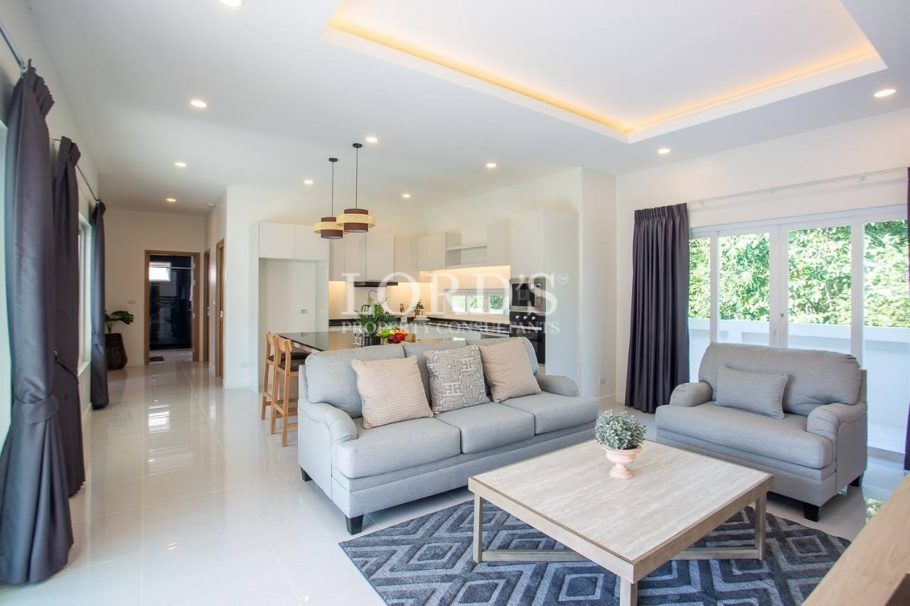 109 Bright living room with sofa and open layout