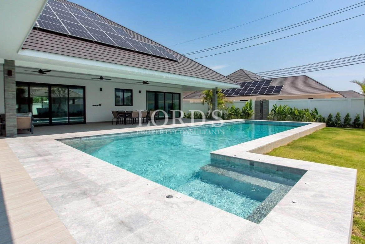 Modern villa with private swimming pool and solar panels