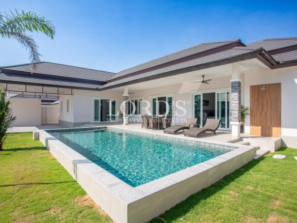 Modern house with private swimming pool and lawn