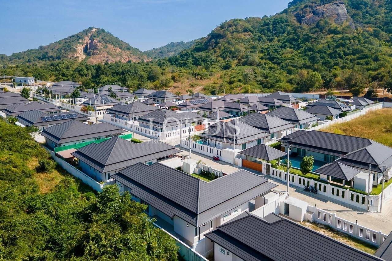 111 Aerial view of residential area near hills