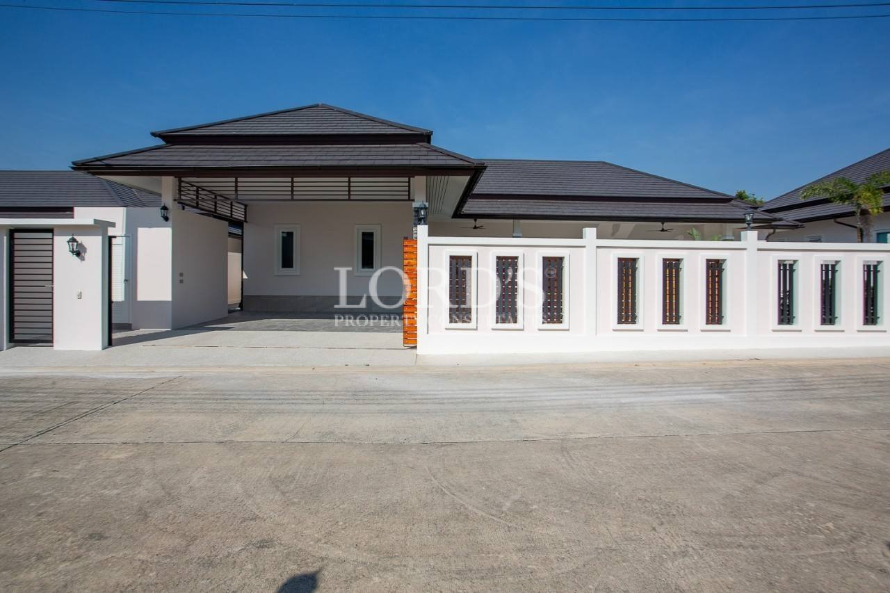 112 House exterior with driveway and garage