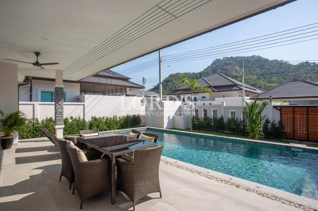117 Outdoor seating area beside swimming pool
