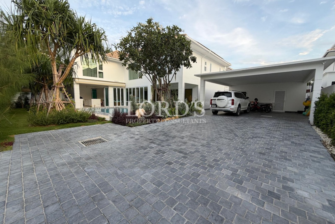 Driveway with modern villa exterior