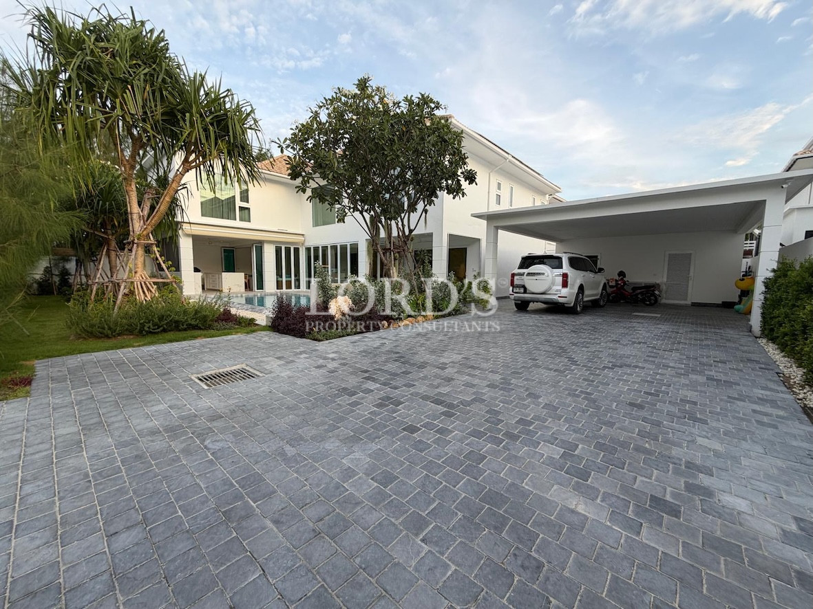 Driveway with modern villa exterior
